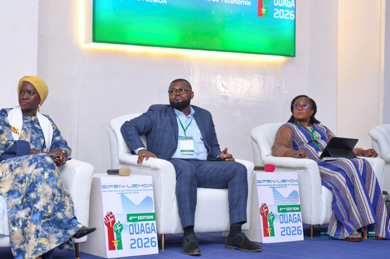 Eklin seated among panelists at SIPEN-UEMOA, 4th edition, Ouagadougou 2026